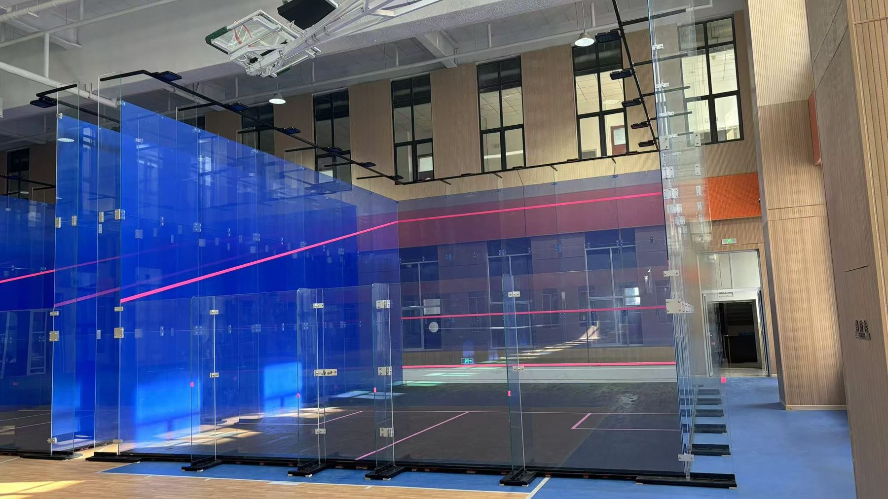 Multi-court glass courts in a sports hall