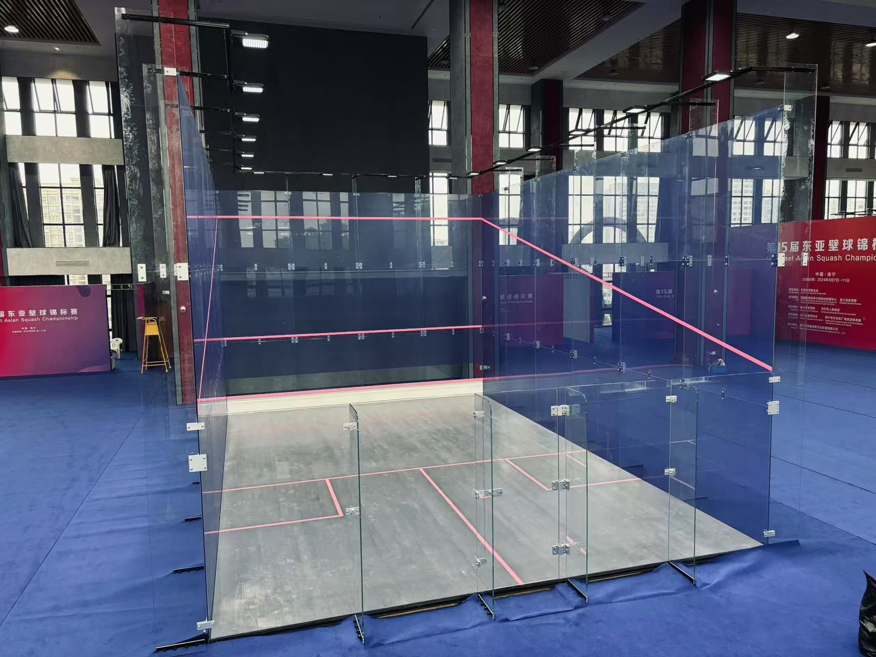 LED lighting system above a glass court